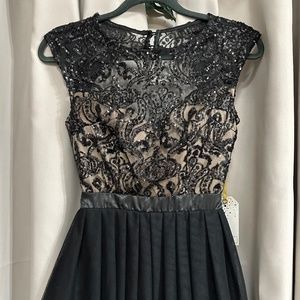 Gorgeous Open Back, Black Semi- Formal Dress with lace bodice and tulle skirt.